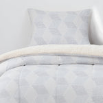 Plumon  Reversible Sherpa 1.5 Plaza Block. Gris DIB